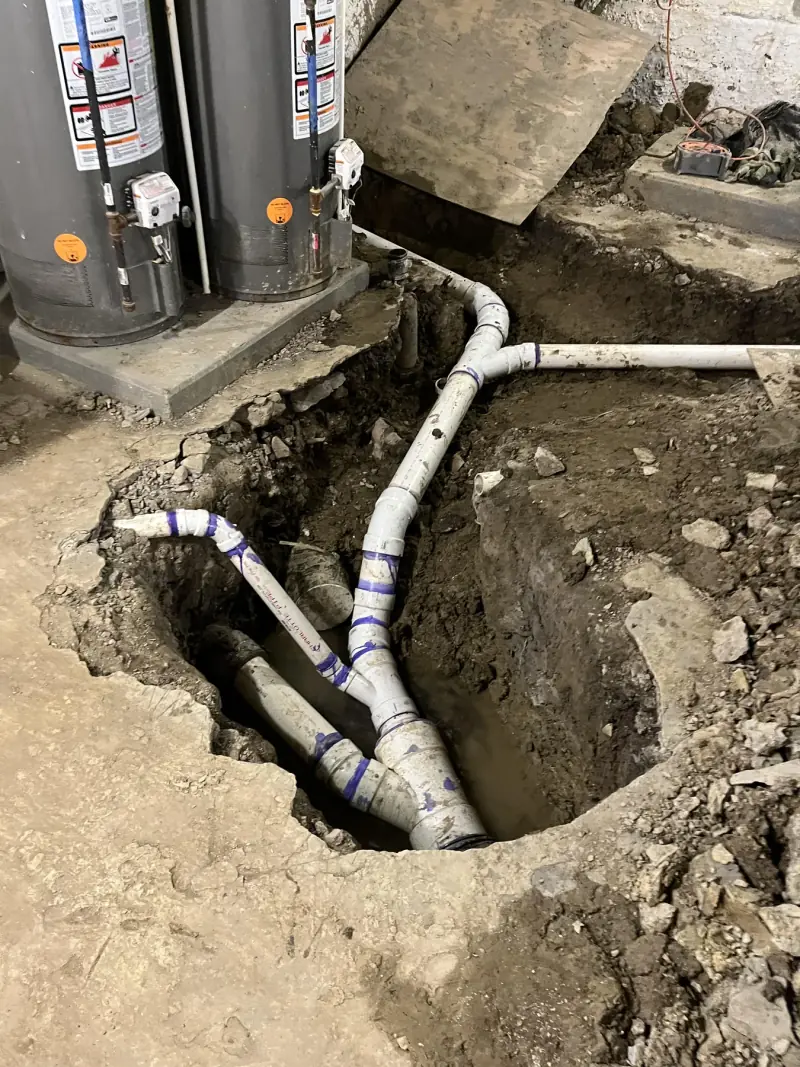 Basement plumbing discharge work