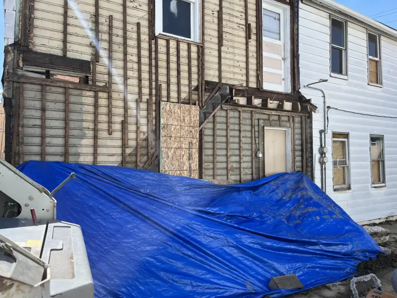 Rear bump-out demolition with the exterior wall exposed