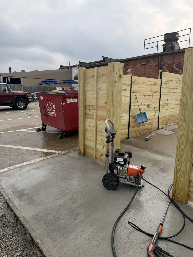 Fence installation underway along a property line