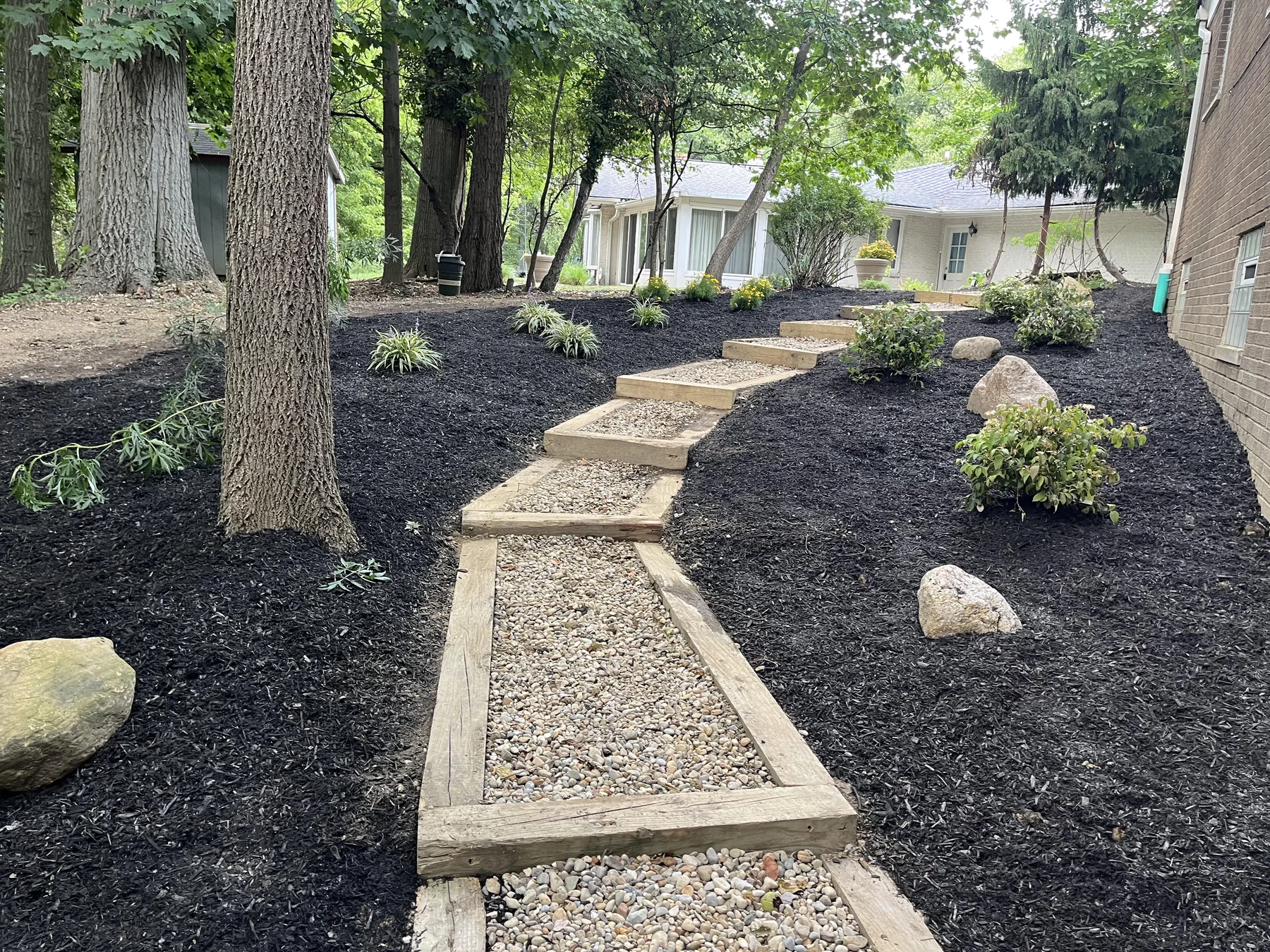 Landscaping restored after foundation waterproofing work